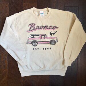Junk Food Ford Bronco Sweatshirt Est. 1966 (Tan with Pink) - Size Extra Small